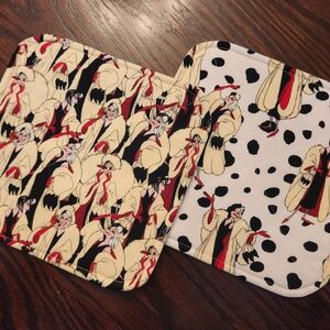 Handmade reversible Cruella themed potholders,  set of 2.